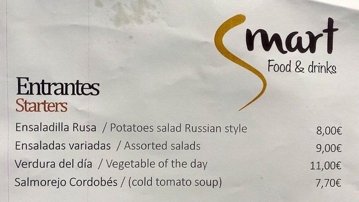 Russian salad is seen in a menu at the NATO summit media centre restaurant in Madrid, Spain, June 28, 2022. REUTERS/Sabine Siebold