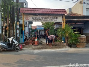 Siswa SDN di Tangsel Bisa Masuk ke Sekolah Usai Pembangunan Tanggul Disetop