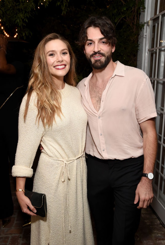 LOS ANGELES, CA - SEPTEMBER 15:  Elizabeth Olsen (L) and Robbie Arnett attend the 2017 Gersh Emmy Party presented by Tequila Don Julio 1942 on September 15, 2017 in Los Angeles, California.  (Photo by Michael Kovac/Getty Images for Gersh)