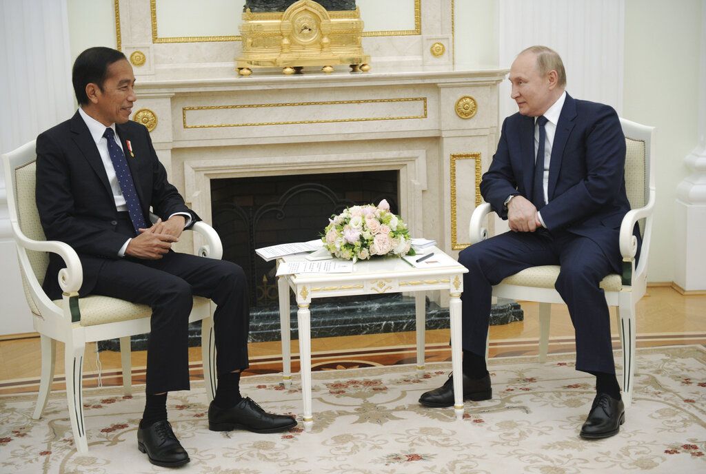 Russian President Vladimir Putin, right, meets with Indonesian President Joko Widodo at the Kremlin in Moscow, Russia, Thursday, June 30, 2022. (Mikhail Klimentyev, Sputnik, Kremlin Pool Photo via AP)
