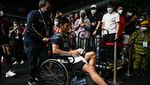 Cedera, Vito Keluar Axiata Arena dengan Kursi Roda