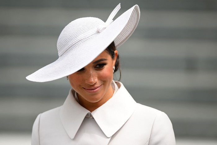 Meghan, Duchess of Sussex leaves after attending the National Service of Thanksgiving for The Queens reign at Saint Pauls Cathedral in London on June 3, 2022 as part of Queen Elizabeth IIs platinum jubilee celebrations. - Queen Elizabeth II kicked off the first of four days of celebrations marking her record-breaking 70 years on the throne, to cheering crowds of tens of thousands of people. But the 96-year-old sovereigns appearance at the Platinum Jubilee -- a milestone never previously reached by a British monarch -- took its toll, forcing her to pull out of a planned church service. (Photo by Daniel LEAL / POOL / AFP) (Photo by DANIEL LEAL/POOL/AFP via Getty Images)
