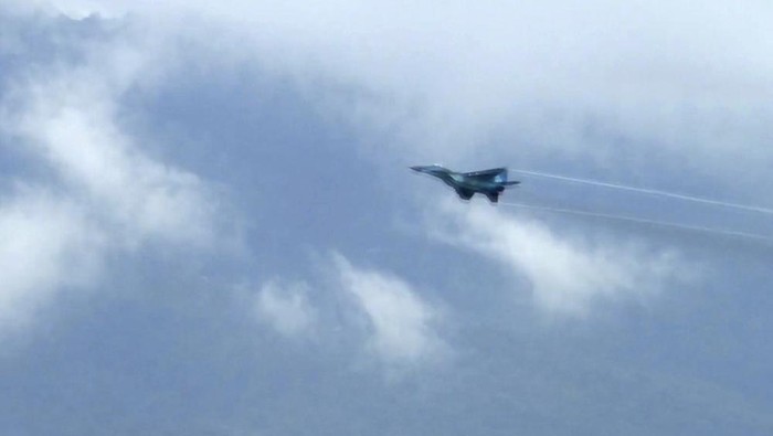 In this image taken from video, a fighter jet flies overhead and visible from Tak province, Thailand on Thursday, June 30, 2022. A Myanmar fighter jet crossed the border into Thailands airspace, prompting Thai air force jets to scramble and officials to order the evacuation of villages and classrooms, officials said. (AP Photo/Chiravut Rungjumrusrussamee)