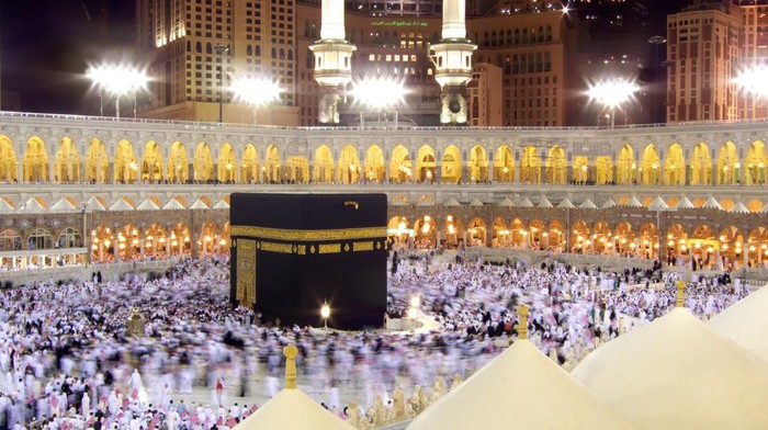 Muslim pilgrims are revolving around Kaaba in Mecca Saudi Arabia.