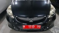 1 (Satu) Unit Mobil Sedan Honda Jazz GD36 1.5 S VTI MT CKD Warna Hitam Metalik Nomor Polisi B1715 DQ Tahun 2007. Nilai limit Rp 58.313.000 dengan Nilai Jaminan Rp 20.500.000. Foto: Dok. KPK