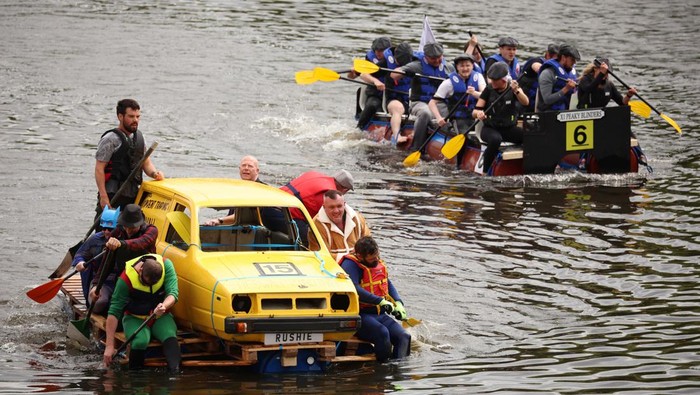 Competitors dressed as characters from British television series 'Little Britain' take part in the annual Chester Raft Race on the River Dee in Chester, Britain, July 3, 2022. REUTERS/Phil Noble     TPX IMAGES OF THE DAY