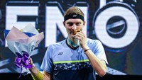 Terbaru, Viktor Axelsen juara Malaysia Open 2022. Di laga final, Kento Momota dibantai dengan angka telak 21-4 dan 21-7 (Getty Images)