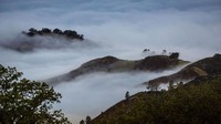Kabut yang menyelimuti pegunungan Figueroa itu terlihat bak negeri di atas awan. 
