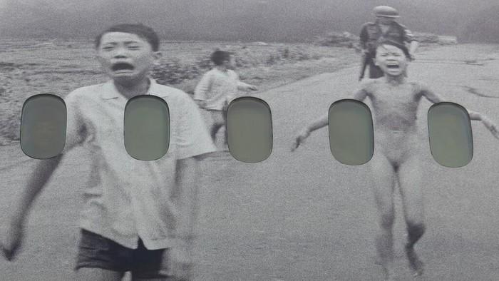 Kim Phuc, the girl in the famous 1972 Vietnam napalm attack photo, poses for a picture in front of a plane transporting refugees fleeing the war in Ukraine to Canada, from Frederic Chopin Airport in Warsaw, Poland, Monday, July 4, 2022. Phuc's iconic Associated Press photo in which she runs with her napalm-scalded body exposed, was etched on the private NGO plane that flew the refugees Monday to the city of Regina, the capital of the Canadian province of Saskatchewan. (AP Photo/Michal Dyjuk)