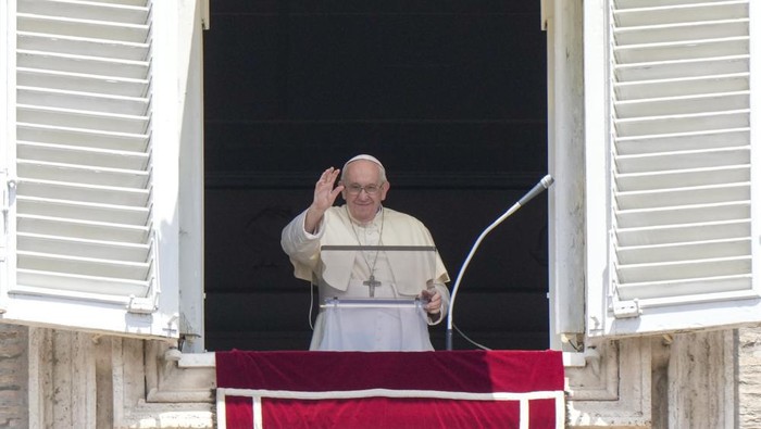 Pope Francis recites the Angelus noon prayer from the window of his studio overlooking St.Peters Square, at the Vatican, Sunday, July 3, 2022. (AP Photo/Andrew Medichini)