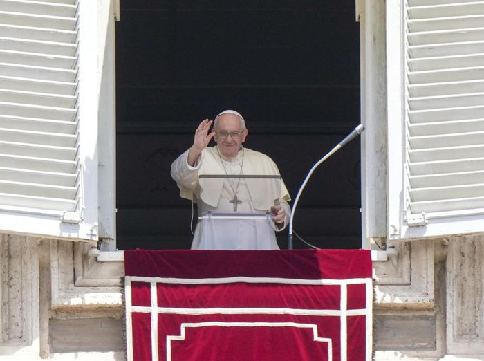 Pope Francis recites the Angelus noon prayer from the window of his studio overlooking St.Peters Square, at the Vatican, Sunday, July 3, 2022. (AP Photo/Andrew Medichini)
