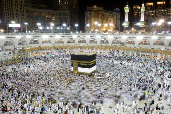 Muslim pilgrims, from all around the World, revolving around the Kaaba at night during Hajj in Saudi Arabia