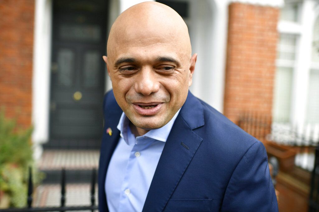 Britain's Former Health Secretary Sajid Javid leaves his home in south west London a day after his resignation, Wednesday July 6, 2022. A defiant British Prime Minister Boris Johnson is battling to stay in power after his government was rocked by the resignation of two top ministers. His first challenge is getting through Wednesday, where he faces tough questions at the weekly Prime Minister's Questions session in Parliament, and a long-scheduled grilling by a committee of senior lawmakers. (Beresford Hodge/PA via AP)