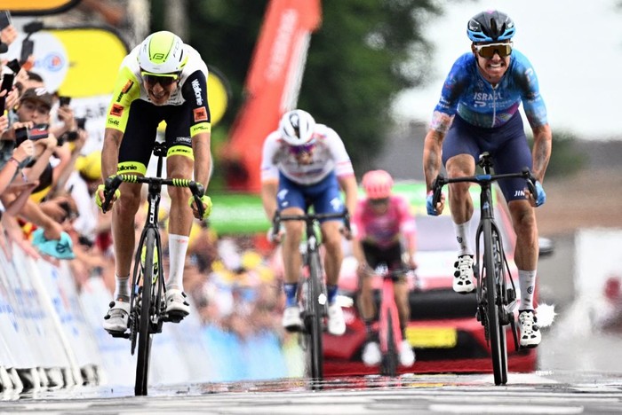 1241736412 UAE Team Emirates team's Slovenian rider Tadej Pogacar (3rd R) wearing the best young rider's white jersey, Ineos Grenadiers team's British rider Geraint Thomas (2nd R) and Ineos Grenadiers team's Dutch rider Dylan Van Baarle (R) cycle across a cobblestone sector in the final kilometers of the 5th stage of the 109th edition of the Tour de France cycling race, 153,7 km between Lille and Arenberg Porte du Hainaut, in northern France, on July 6, 2022. (Photo by Bernard PAPON / POOL / AFP) (Photo by BERNARD PAPON/POOL/AFP via Getty Images)