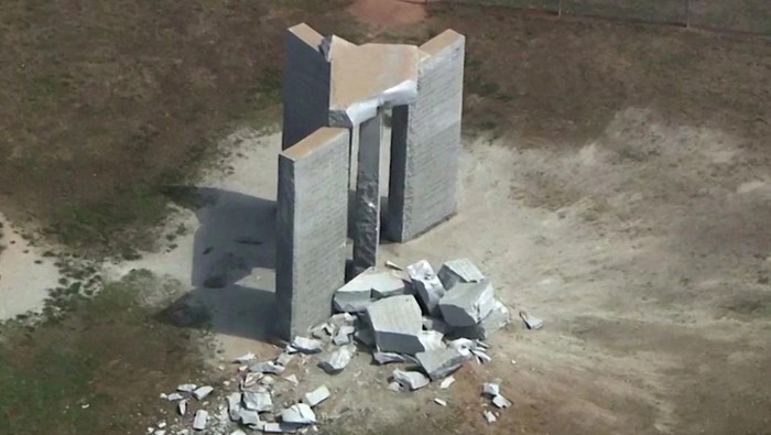 Rubble is cast around the Georgia Guidestones after an explosion in Elberton, Georgia, U.S., July 6, 2022 in a still image from video. ABC Affiliate WSB-TV via REUTERS