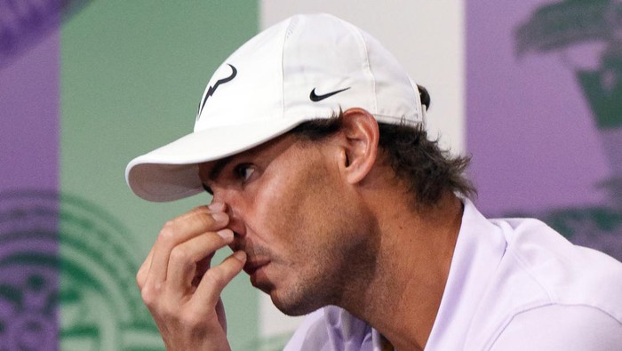 Spains Rafael Nadal holds a press conference on the eleventh day of the 2022 Wimbledon Championships at The All England Tennis Club in Wimbledon, southwest London, on July 7, 2022. - Rafael Nadal announced today that he is withdrawing from Wimbledon after failing to recover from an abdominal injury. - RESTRICTED TO EDITORIAL USE (Photo by Andrew TOTH / various sources / AFP) / RESTRICTED TO EDITORIAL USE (Photo by ANDREW TOTH/AELTC/AFP via Getty Images)