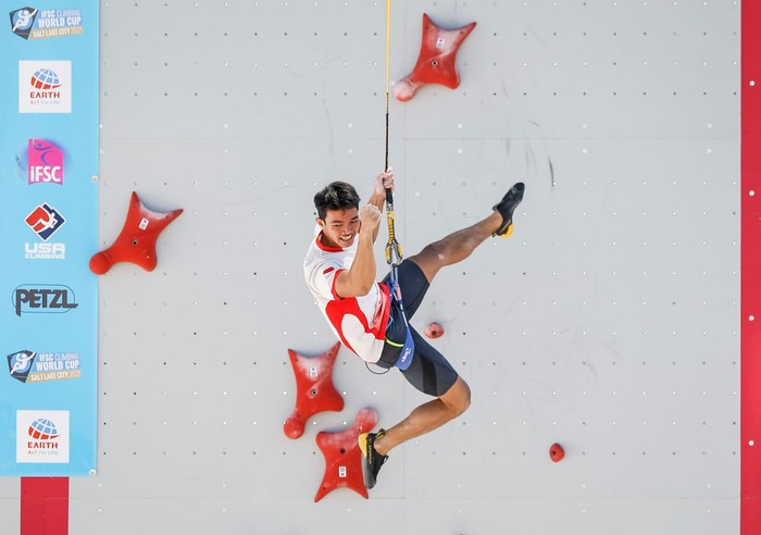 SALT LAKE CITY, UTAH - MAY 28: Kiromal Katibin of Indonesia celebrates breaking the speed world record with a 5.258 during the speed climbing qualifications of the IFSC Climbing World Cup at Industry SLC on May 28, 2021 in Salt Lake City, Utah. (Photo by Andy Bao/Getty Images)