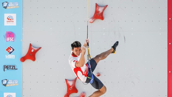 SALT LAKE CITY, UTAH - MAY 28: Kiromal Katibin of Indonesia celebrates breaking the speed world record with a 5.258 during the speed climbing qualifications of the IFSC Climbing World Cup at Industry SLC on May 28, 2021 in Salt Lake City, Utah. (Photo by Andy Bao/Getty Images)