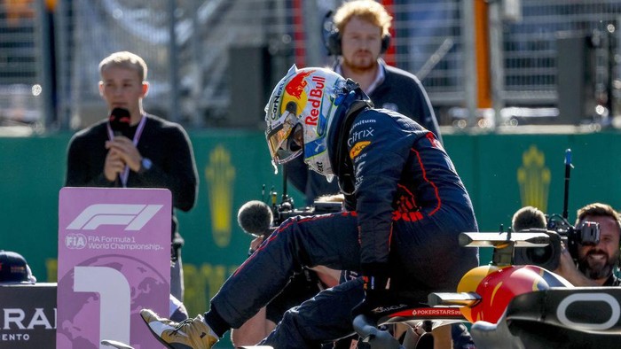 Pole position winner Red Bull Racings Dutch driver Max Verstappen climbs out of his car after the qualifying session at the Red Bull Ring race track in Spielberg, Austria, on July 8, 2022, ahead of the Formula One Austrian Grand Prix. - Austria OUT (Photo by ERWIN SCHERIAU / APA / AFP) / Austria OUT (Photo by ERWIN SCHERIAU/APA/AFP via Getty Images)