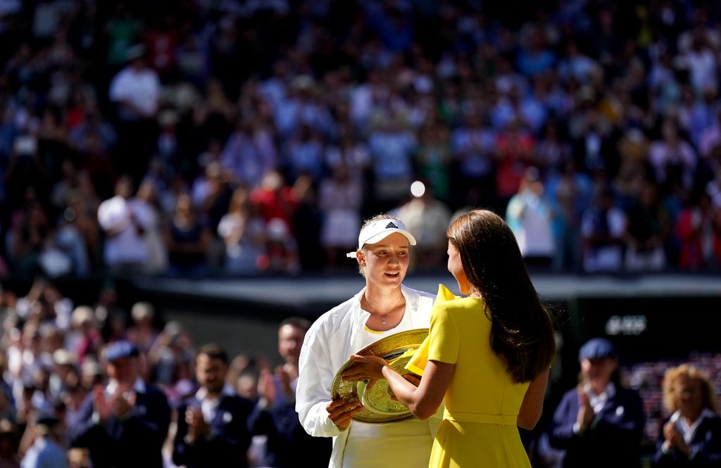Elena Rybakina is presented with the The Venus Rosewater Dish by The Duchess of Cambridge following victory over Ons Jabeur in The Final of the Ladies' Singles on day thirteen of the 2022 Wimbledon Championships at the All England Lawn Tennis and Croquet Club, Wimbledon. Picture date: Saturday July 9, 2022. (Photo by Zac Goodwin/PA Images via Getty Images)