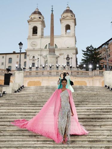 ROME, ITALY - JULY 08: Models walks the Valentino haute couture fall/winter 22/23 fashion show on July 08, at Piazza Di Spagna 2022 in Rome, Italy. (Photo by Ernesto Ruscio/Getty Images)