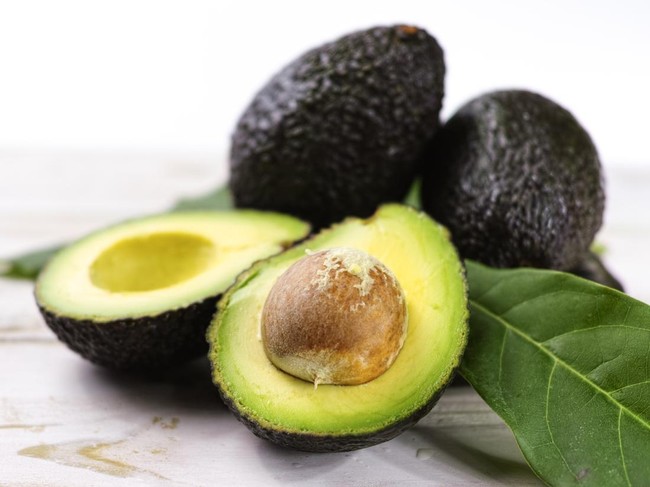 Green ripe avocado from organic avocado plantation - healthy food