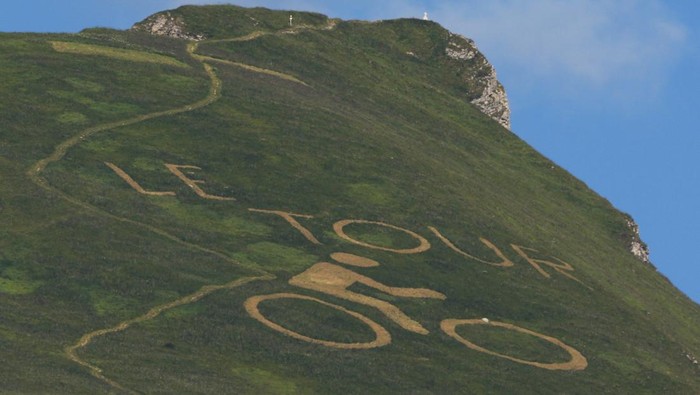 Cycling - Tour de France - Stage 9 - Aigle to Chatel les Portes du Soleil - France - July 10, 2022 General view as a marking is seen on a mountain peak in Morzine during stage 9 REUTERS/Gonzalo Fuentes