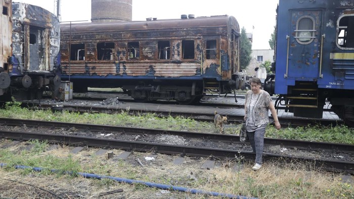 Burned-out wagons stand on tracks at the station in Mariupol, in an area controlled by Russian-backed separatist forces, eastern Ukraine, Monday, July 11, 2022. (AP Photo)