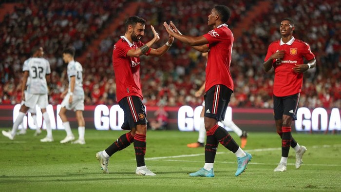 BANGKOK, THAILAND - JULY 12: Anthony Martial of Manchester United celebrates after scoring a goal to make it 3-0 during the preseason friendly match between Liverpool and Manchester United at Rajamangala Stadium on July 12, 2022 in Bangkok, Thailand. (Photo by Matthew Ashton - AMA/Getty Images)