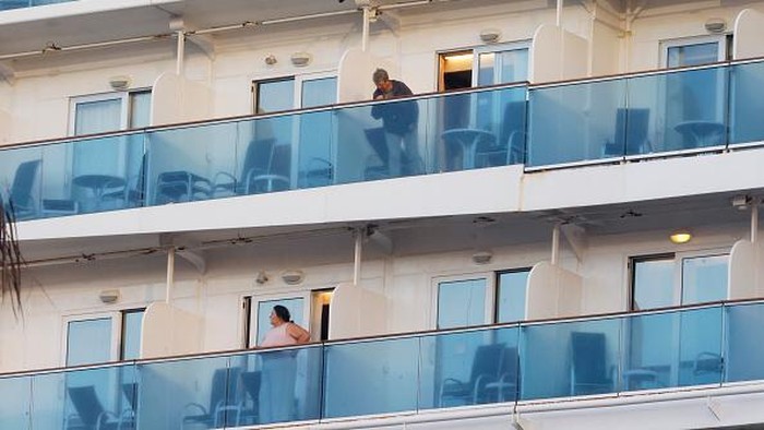 SYDNEY, AUSTRALIA - JULY 13: The Coral Princess docks at Circular Quay on July 13, 2022 in Sydney, Australia. The Coral Princess, currently experiencing a COVID-19 outbreak on board, arrived in Sydney on Wednesday morning. (Photo by Jenny Evans/Getty Images)