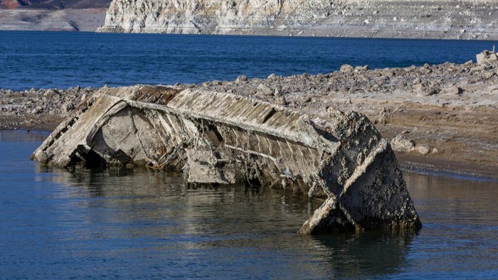 A WWII ear landing craft used to transport troops or tanks was revealed on the shoreline near the Lake Mead Marina as the waterline continues to lower at the Lake Mead National Recreation Area on Thursday, June 30, 2022, in Boulder City. (L.E. Baskow/Las Vegas Review-Journal via AP)