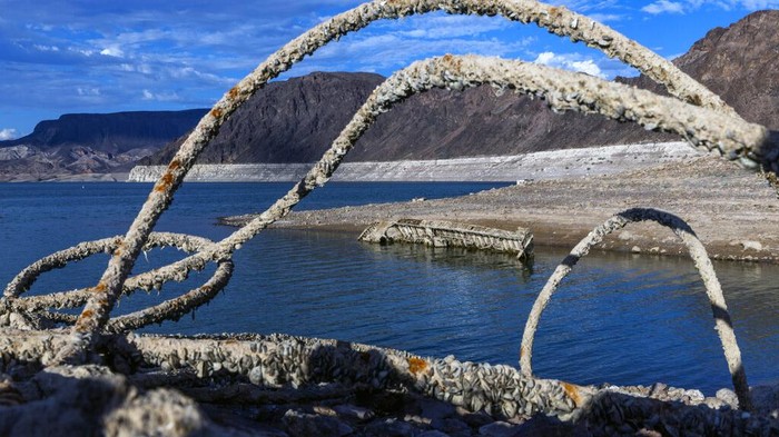 A WWII ear landing craft used to transport troops or tanks was revealed on the shoreline near the Lake Mead Marina as the waterline continues to lower at the Lake Mead National Recreation Area on Thursday, June 30, 2022, in Boulder City. (L.E. Baskow/Las Vegas Review-Journal via AP)