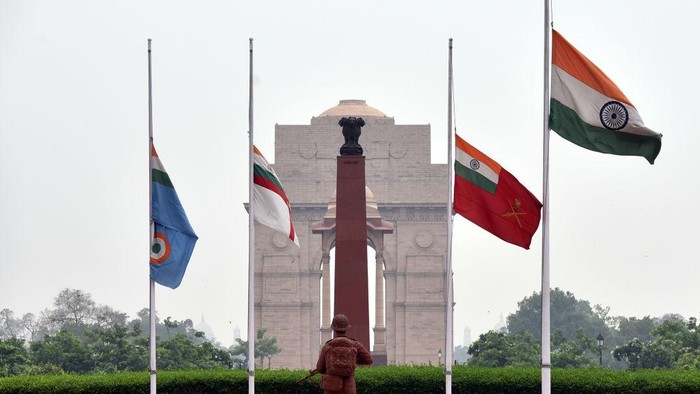 NEW DELHI, INDIA - JULY 9: The Indian national flag flies at half-mast at the National War Memorial as one-day state mourning is being observed in the country as a mark of respect to former Japanese Prime Minister Shinzo Abe, on July 9, 2022 in New Delhi, India. Shinzo Abe, who was Japan's longest serving modern leader, was gunned down while making a campaign speech on Friday morning by a 41-year-old man. 67-year-old Japanese leader died after he was shot while giving a campaign speech in the southern Japanese city of Nara, even though he was rushed to a hospital, within a few hours the hospital had declared him dead. (Photo by Sonu Mehta/Hindustan Times via Getty Images)