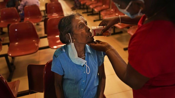 People wait to receive medical drugs at a government run hospital in Colombo, Sri Lanka, June 6, 2022. Doctors in Sri Lanka are urging their patients not to fall ill or get into accidents as the countrys economic crisis leaves its trusted health system without medicines and other vital supplies. Sri Lanka has run short of money to pay for basic imports like fuel and food, and medicine has also run scarce. (AP Photo/Eranga Jayawardena)