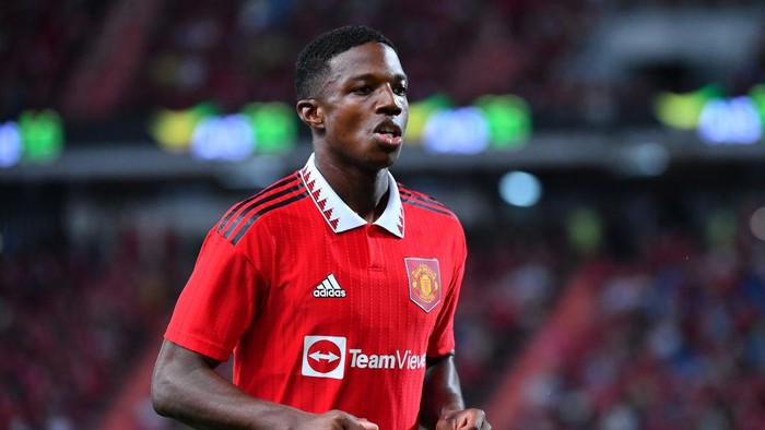 BANGKOK, THAILAND - JULY 12: Tyrell Malacia #12 of Manchester United in action during the preseason friendly match between Liverpool and Manchester United at Rajamangala Stadium on July 12, 2022 in Bangkok, Thailand. (Photo by Supakit Wisetanuphong/MB Media/Getty Images)