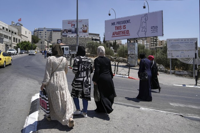 US Biden Mideast A billboard saying