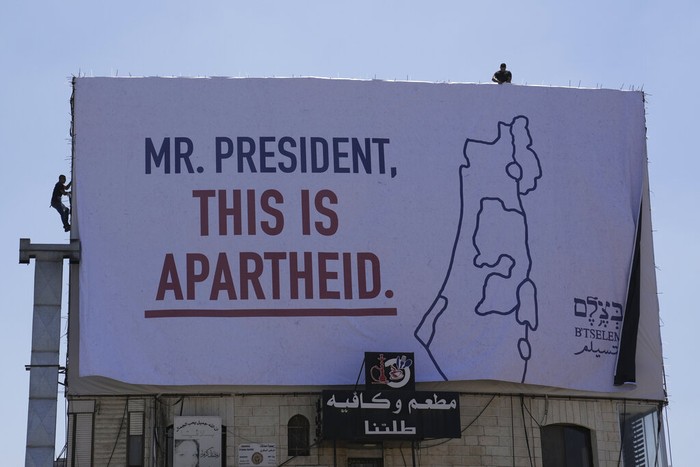 US Biden Mideast A billboard saying