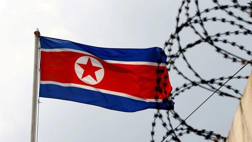 A North Korea flag flutters next to concertina wire at the North Korean embassy in Kuala Lumpur, Malaysia March 9, 2017. REUTERS/Edgar Su