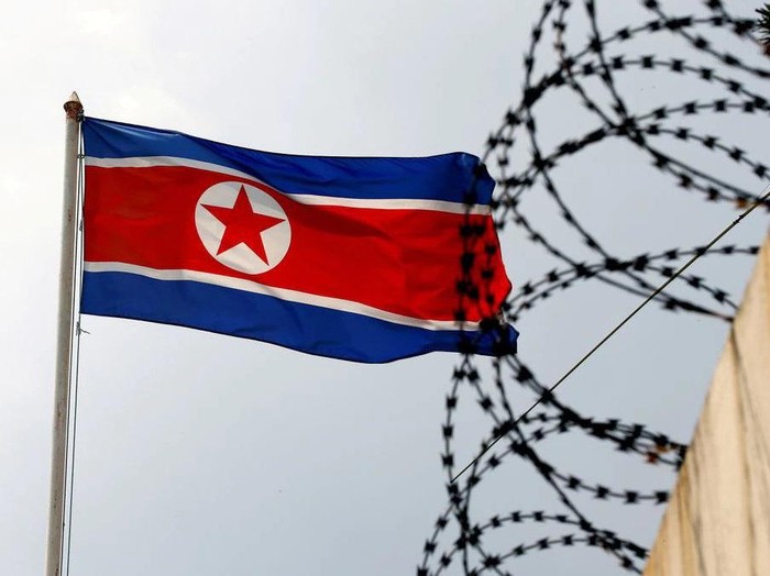A North Korea flag flutters next to concertina wire at the North Korean embassy in Kuala Lumpur, Malaysia March 9, 2017. REUTERS/Edgar Su
