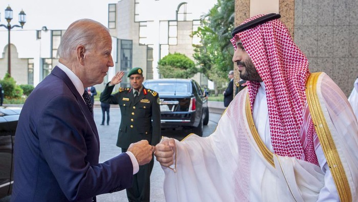 In this image released by the Saudi Royal Palace, Saudi Crown Prince Mohammed bin Salman, right, greets President Joe Biden with a fist bump after his arrival at Al-Salam palace in Jeddah, Saudi Arabia, Friday, July 15, 2022. (Bandar Aljaloud/Saudi Royal Palace via AP)