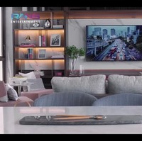 Smart tv melengkapi ruang keluarga yang terlihat nyaman. Rumah seharga Rp 71 miliar itu semakin elegan dengan rak tinggi bersekat yang dihias buku dan pajangan. Foto: dok. YouTube Rans Entertainment