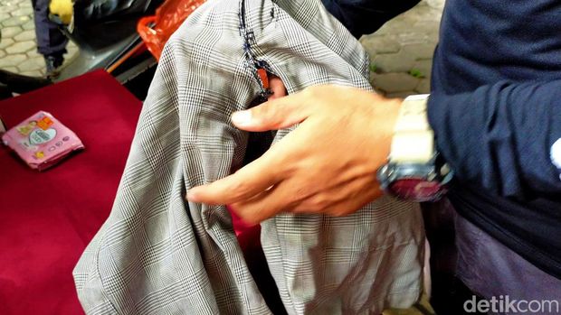 Polisi temukan lubang di celana pendek pria diduga pelaku onani di Banyuwangi saat beraksi.