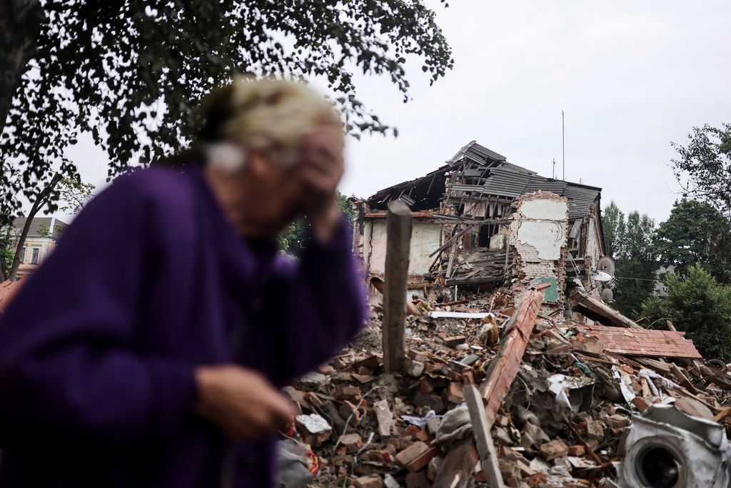 A family's picture is seen amidst debris at the site of a military strike in Chuhuiv, about 6 km from the frontline, amid Russia's invasion of Ukraine, in Kharkiv region, Ukraine July 16, 2022. REUTERS/Nacho Doce