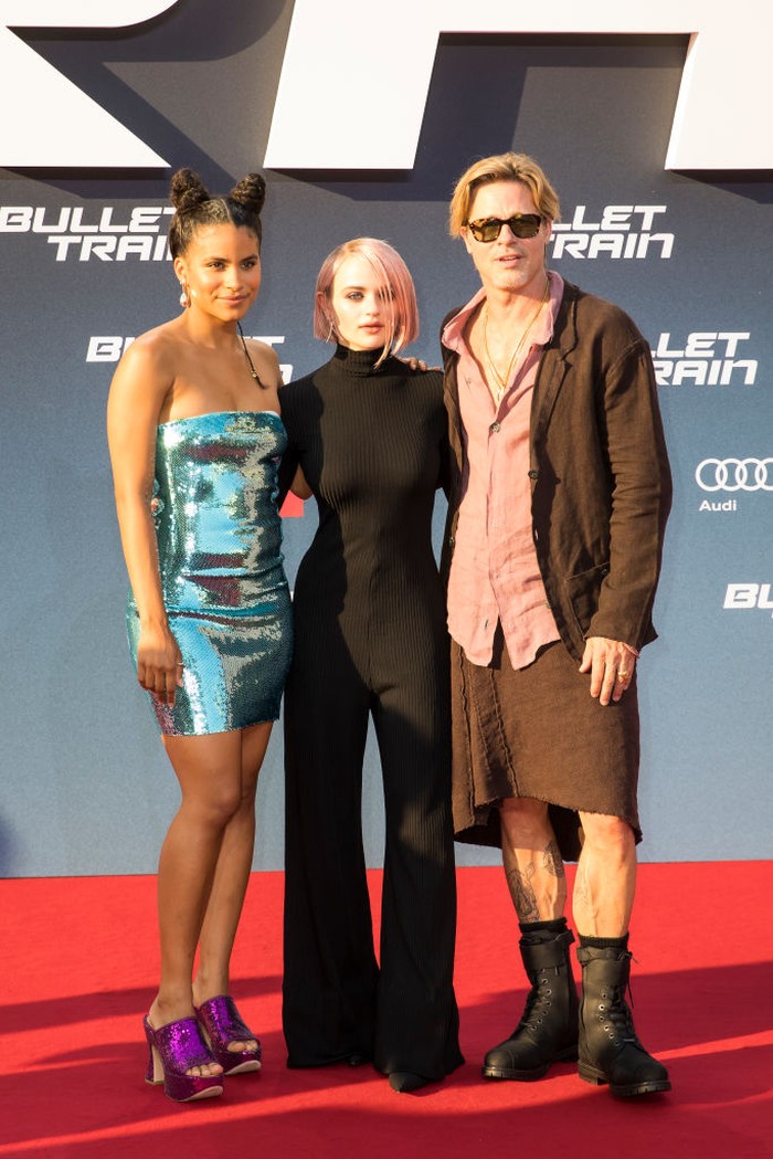 19 July 2022, Berlin: Brad Pitt, actor, wears a skirt as he arrives at the German premiere of the motion picture 