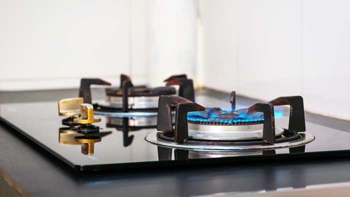 Closeup flames from the gas stove in the kitchen.