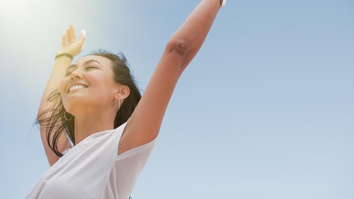 Asian beautiful woman enjoying the sun.