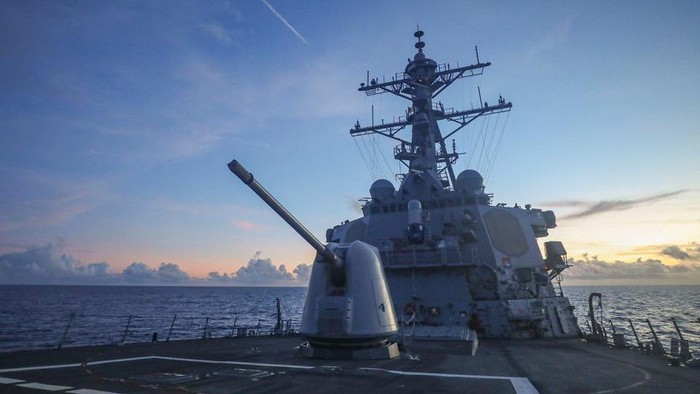 Arleigh Burke-class guided-missile destroyer USS Benfold (DDG 65), forward-deployed to the U.S. 7th Fleet area of operations, conducts underway operations in the South China Sea, in this handout picture released on July 13, 2022. U.S. Navy/Handout via REUTERS