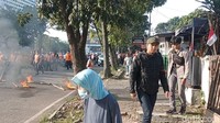Kericuhan pun sempat terjadi sebelum eksekusi lahan dilakukan (Foto: Sudirman Wamad)