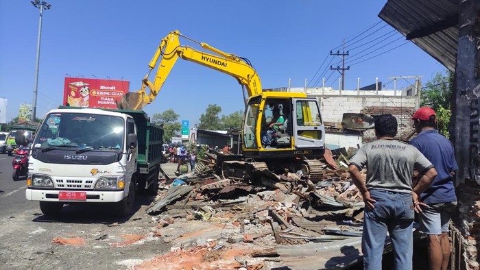 bundaran aloha macet dampak pelebaran jalan