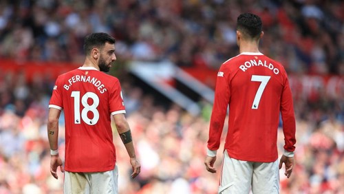 MANCHESTER, ENGLAND - APRIL 16: Bruno Fernandes of Manchester United and Cristiano Ronaldo of Manchester United look on during the Premier League match between Manchester United and Norwich City at Old Trafford on April 16, 2022 in Manchester, United Kingdom. (Photo by Simon Stacpoole/Offside/Offside via Getty Images)